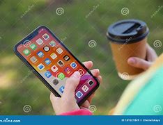 Image result for Someone Holding iPhone 11