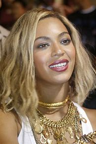 Image result for Beyonce in a Curly Blonde Wig
