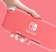 Image result for Nintendo Switch Lite All Coral
