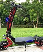 Image result for Reclining E Scooter Fat Tire Foot Rest On Front Wheel