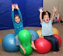 Image result for Sitting On Peanut Ball