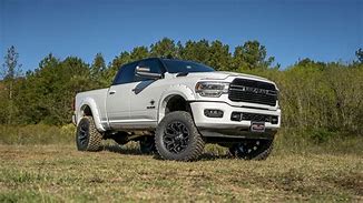 Image result for Black Ram Dually On Grass