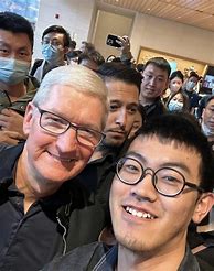 Image result for Tim Cook iPhone