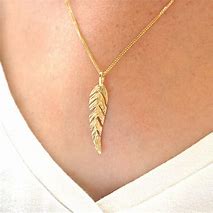 Image result for feathers jewelry gold