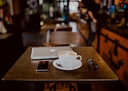 Image result for Laptop Phone On Table