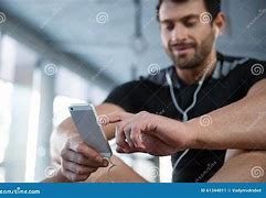 Image result for Picture of Someone at Gym On Phone
