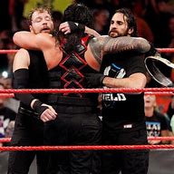 Image result for Seth Rollins Roman Reigns Dean Ambrose Hug Backstage