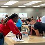 Image result for iPhone in Apple Store