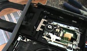 Image result for Xbox 360 Slim Disc Drive Motor Spindle Tear Down
