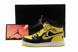 Image result for Black and Yellow Jordan's Kids