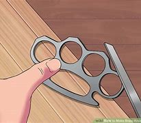 Image result for Iced Out Brass Knuckles