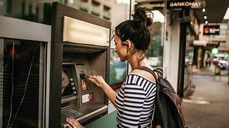 Image result for Person at ATM