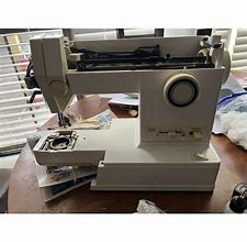 Image result for Singer Sewing Machine 4562 Manual