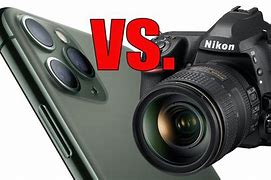 Image result for iPhone 11 Pro Max vs DSLR Night