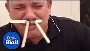 Hilarious moment man struggles to wax his nose - Daily Mail