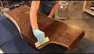 Applying Rubio Monocoat finish to walnut slab coffee table