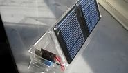 Mini solar charger for charging a cellphone