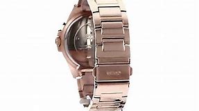 GUESS Rose Gold-Tone Stainless Steel Crystal Watch with Day, Date + 24 Hour Military/Int'l Time.