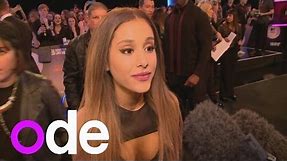 Ariana Grande tells presenter she has lipstick on teeth