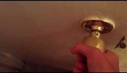 How to unlock a door with a twist knob lock.