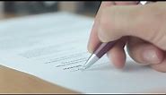 Man Signing Business Contract in the Office (Stock Footage)