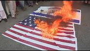 US, Israeli flags set on fire in Karachi during rally in support of Palestinians