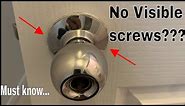 Remove door handle / knob without screws visible