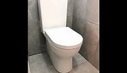 Rimless toilet installation, back to wall