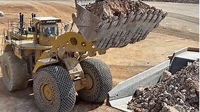 Huge Caterpillar 994 Wheel Loader 215 Tons Loading Caterpillar 777F Dumpers - Samaras Mining Group