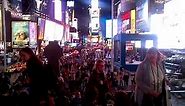 Time Square crowd sings a surprise happy birthday song to a girl.