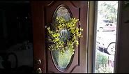 How to hang a wreath on a glass door.