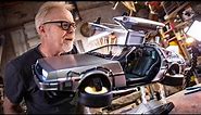 Adam Savage Unboxes The Hot Toys DeLorean Time Machine!