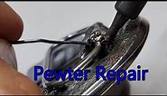 Repairing my favorite pewter belt buckle.