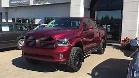 2017 Red Pearl Ram 1500 Sport with a 4" lift