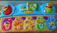 Winnie the pooh musical cot toy piano