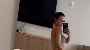 @Kim Kardashian wears the new Fits Everybody Cropped Cami and Long Skirt in Khaki.