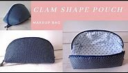 Clam shape pouch - makeup bag