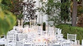This bride and groom focused on a traditional wedding theme with a timeless, elegant feel, featuring a simple décor concept: a black-and-white palette accented with hundreds of fresh pink and champagne-hued florals. Since she had always loved the idea of an at-home wedding, the bride knew with strong certainty that her family’s Beverly Hills estate would be the ideal venue for the celebration. And it was truly magnificent! See more of their stunning at-home wedding in Beverly Hills on our blog. 