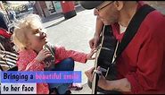 6 year old girl who is blind and autistic plays guitar for the first time