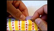 How to hand sew binding to back of quilt