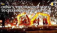 ‘Fire-breathing dragons’ dance at Lunar New Year celebration in China