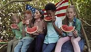 Kids Eating Watermelon Outdoors