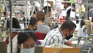 Garment workers, paid by the piece, say they'll keep fighting to change the system