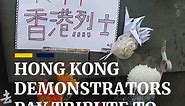 Hong Kong demonstrators pay tribute to 'Raincoat Man'