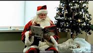 Santa Reading How the Grinch Stole Christmas