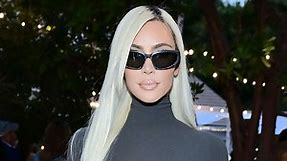Kim Kardashian Paired a Sheer Turtleneck Maxi Dress With Bright Green Boots and a Side Part