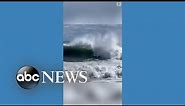 Massive waves crash into Rhode Island coast as Fiona moves north