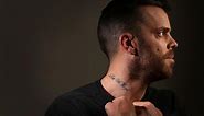 Police Commissioner Chris Dawson stands by ban on neck and hand tattoos