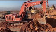 Hitachi Zaxis 670LC Excavator & Caterpillar Excavators Loading Mercedes & MAN Trucks