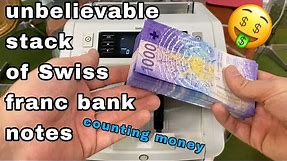 unbelievable stack of swiss 1000 CHF franc bank notes counting by money machine